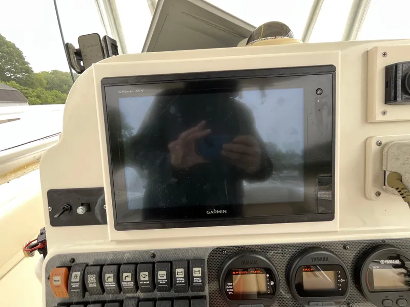 Slide: The Image of 2007 Hydra-Sports 2500CC boat dashboard with Garmin GPS and Yamaha gauges. - 39