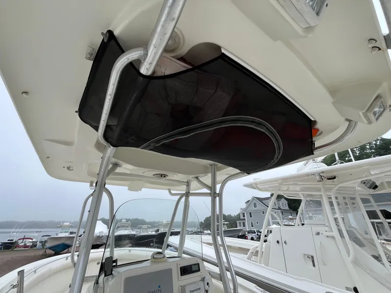 Slide: The Image of 2007 Hydra-Sports 2500CC boat interior with storage netting and console view. - 41