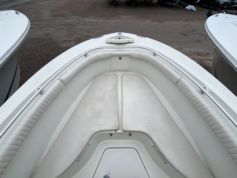 Slide: The Image of 2007 Hydra-Sports 2500CC boat interior with white cushioned seating. - 9