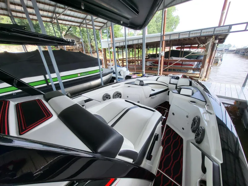 Slide: The Image of 2023 Sunsation 32 CCX boat interior with sleek seating and modern design. - 15