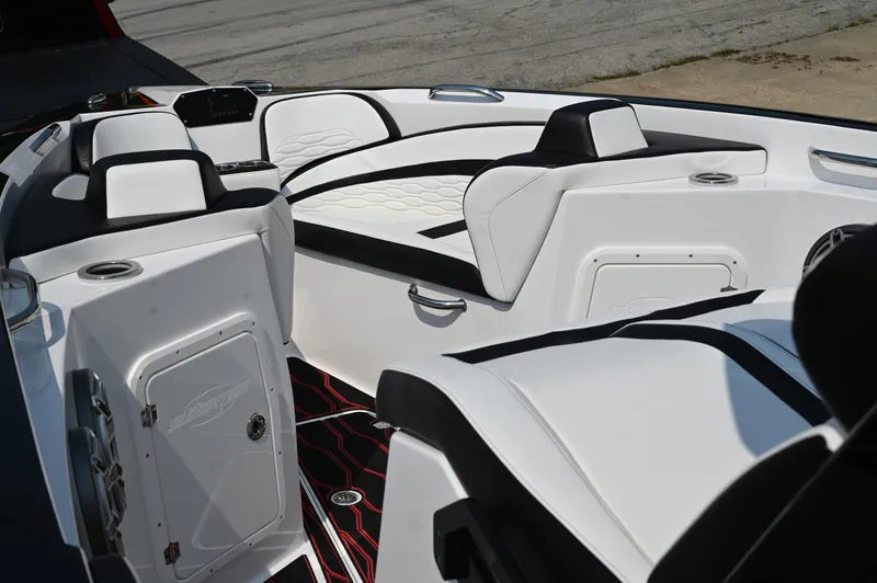 Slide: The Image of 2023 Sunsation 32 CCX boat interior with sleek white seating and modern design. - 23