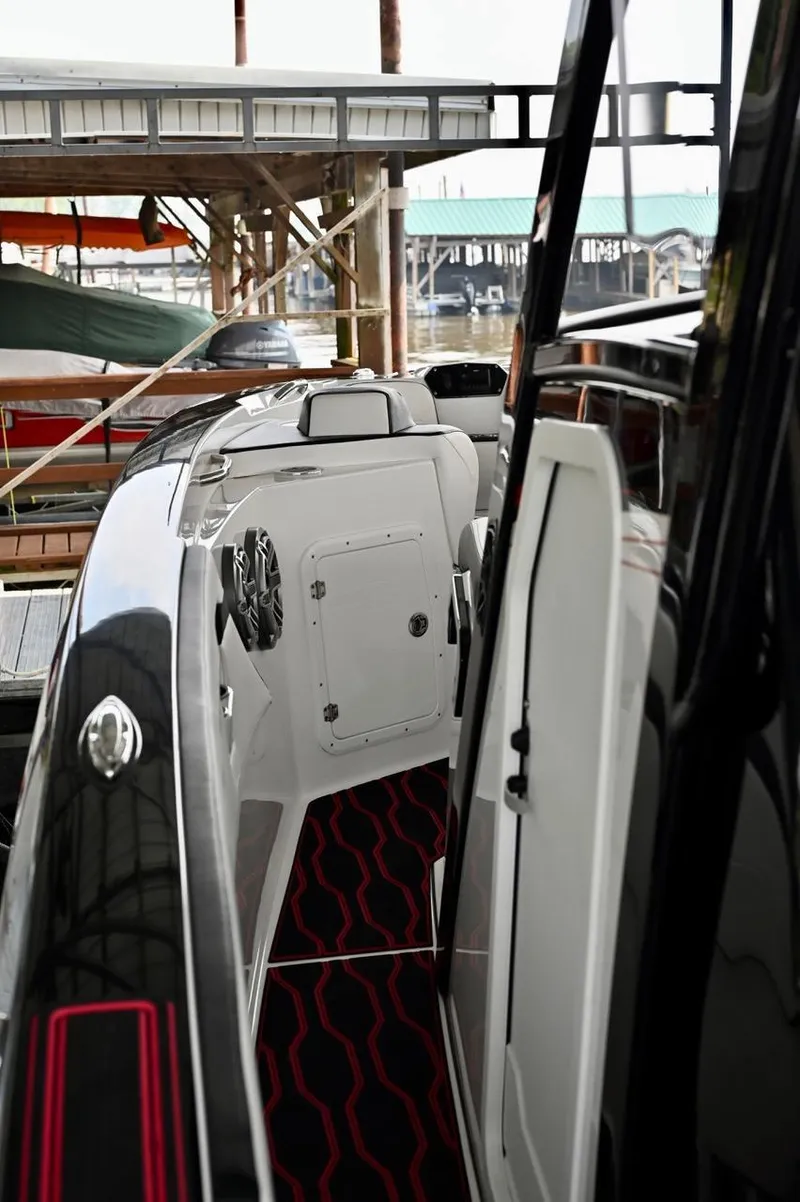 Slide: The Image of 2023 Sunsation 32 CCX boat interior with sleek design and modern features. - 7