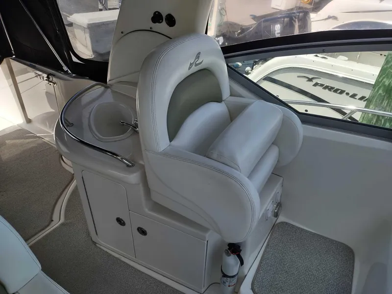 Slide: The Image of 2007 Sea Ray 340 Sundancer boat interior with sleek sink and modern design. - 14