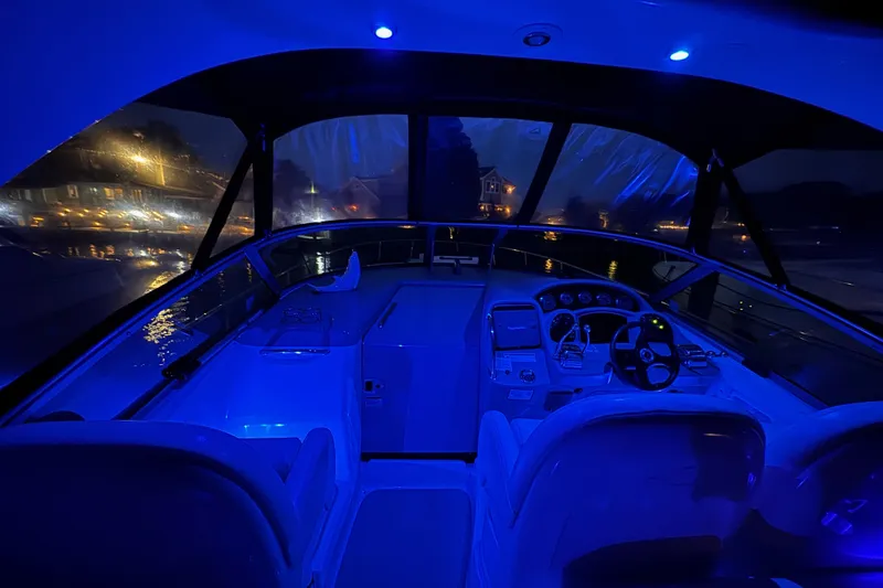 Slide: The Image of Luxurious interior of 2007 Sea Ray 340 Sundancer with elegant wood and leather seating. - 19