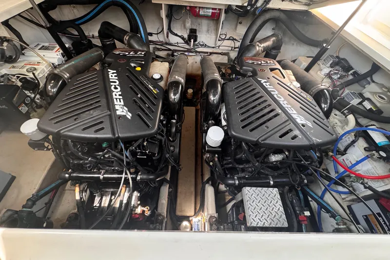 Slide: The Image of Cozy cabin interior of 2007 Sea Ray 340 Sundancer with plush bedding and "Relax" pillow. - 20