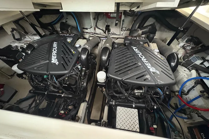 Slide: The Image of Engine room of a 2007 Sea Ray 340 Sundancer with twin Mercury engines. - 25