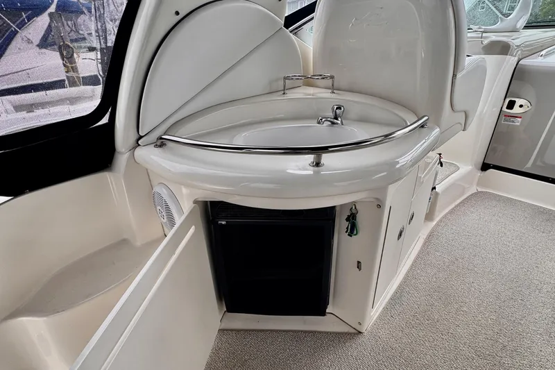 Slide: The Image of 2007 Sea Ray 340 Sundancer boat with black canopy, docked in Philadelphia. - 7