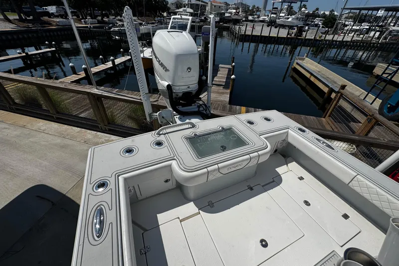 Slide: The Image of 2019 Dorado 25 Flat Deck boat with Mercury engine at marina dock. - 14