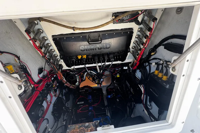 Slide: The Image of Electrical wiring and components inside a 2019 Dorado 25 Flat Deck boat. - 21