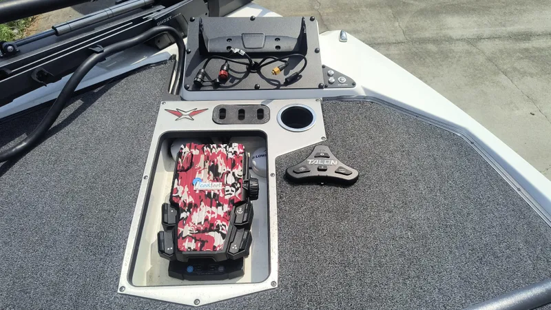 Slide: The Image of 2021 Vexus VX20 boat deck with control panel and Talon anchor system. - 13