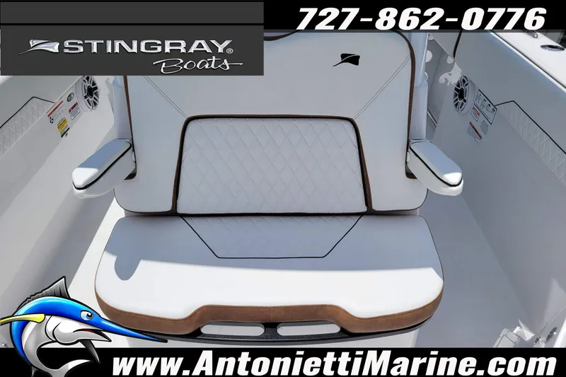 Slide: The Image of 2026 Stingray 253 CC boat seat with logo, contact number, and website details. - 14