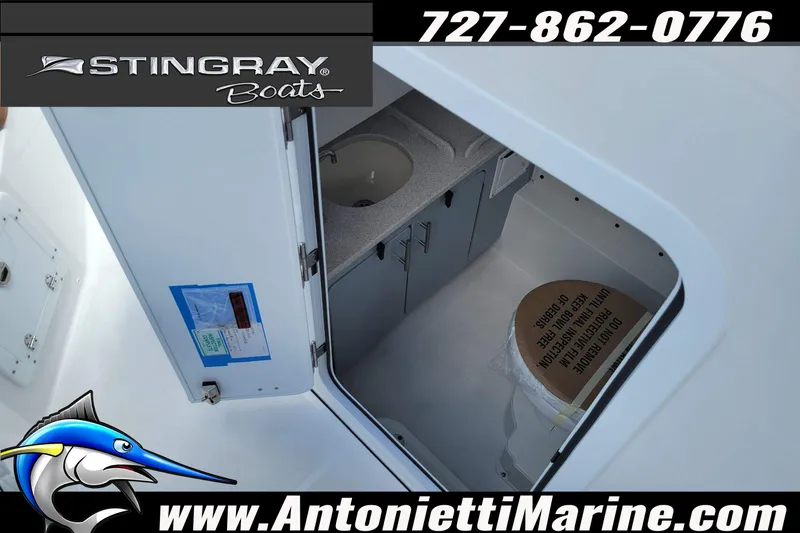 Slide: The Image of 2026 Stingray 253 CC boat interior with sink and storage, Antonietti Marine branding. - 23