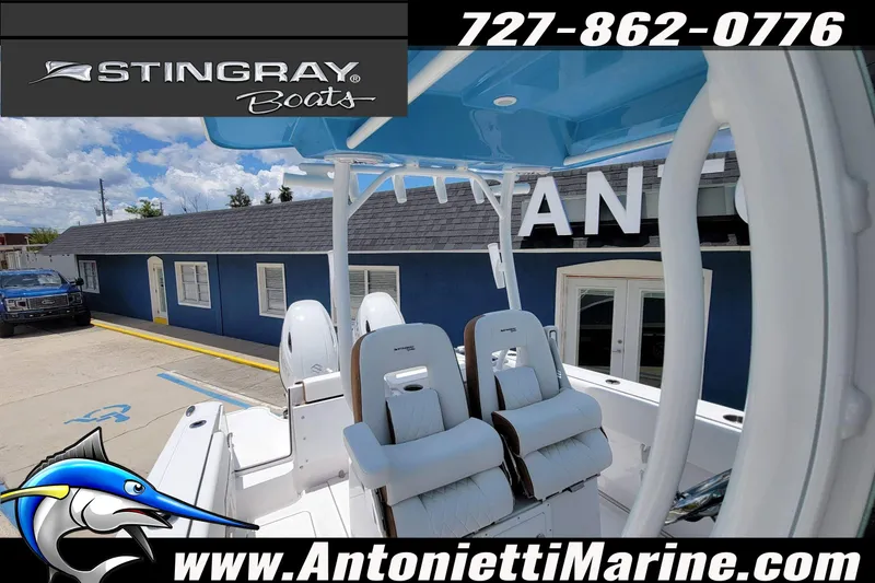 Slide: The Image of 2026 Stingray 253 CC boat interior with seating, displayed at Antonietti Marine dealership. - 3