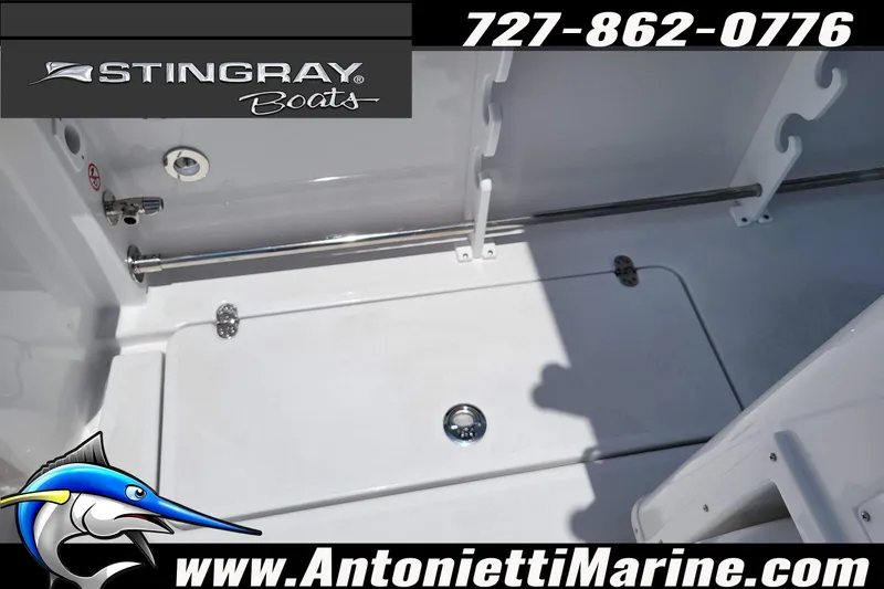 Slide: The Image of 2026 Stingray 253 CC boat interior with storage compartment, showcased by Antonietti Marine. - 42