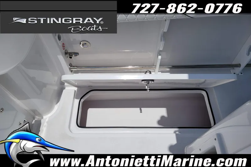 Slide: The Image of 2026 Stingray 253 CC boat storage compartment, Antonietti Marine branding. - 43