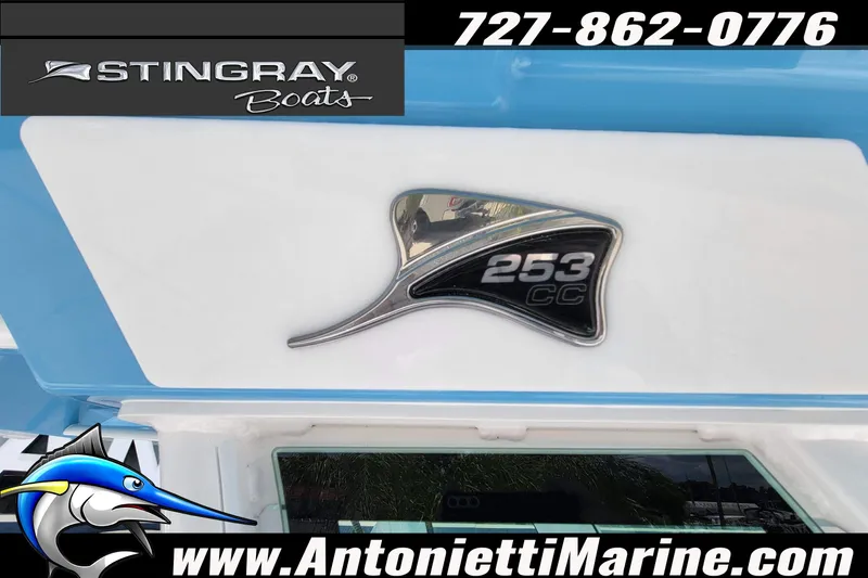 Slide: The Image of 2026 Stingray 253 CC boat emblem with contact and website details. - 5