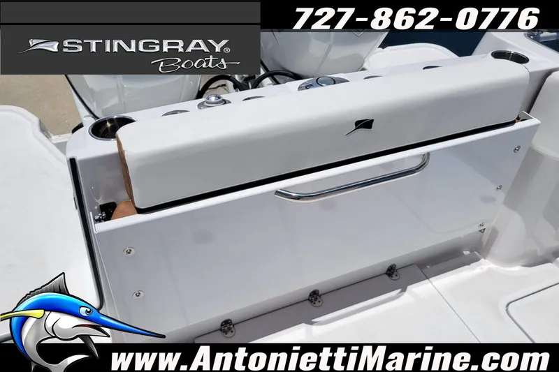 Slide: The Image of 2026 Stingray 253 CC boat interior with seating and storage, Antonietti Marine branding. - 53