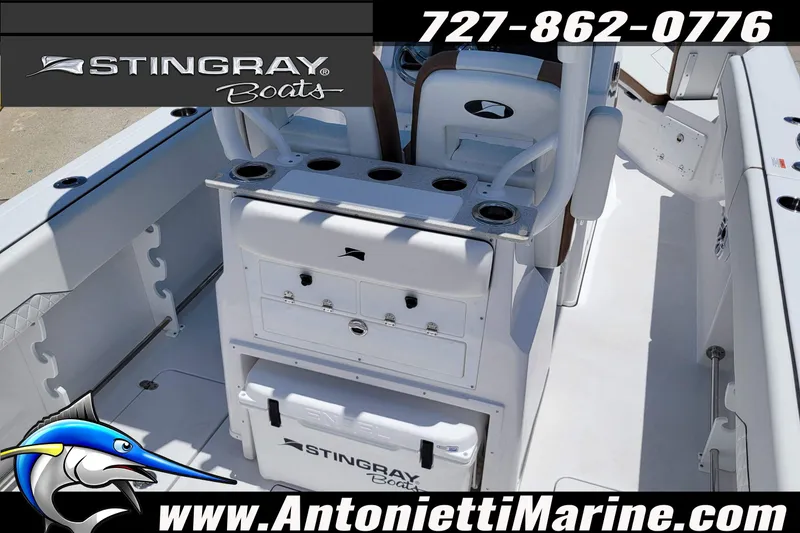 Slide: The Image of 2026 Stingray 253 CC boat interior with seating and storage, featuring Antonietti Marine branding. - 54