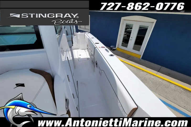 Slide: The Image of 2026 Stingray 253 CC boat interior at Antonietti Marine, showcasing sleek design and features. - 7