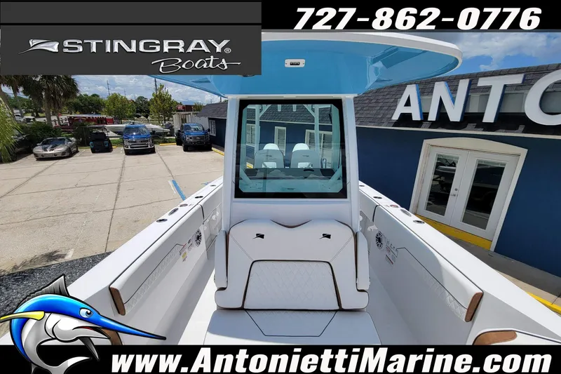 Slide: The Image of 2026 Stingray 253 CC boat at Antonietti Marine dealership, showcasing sleek design and modern features. - 9