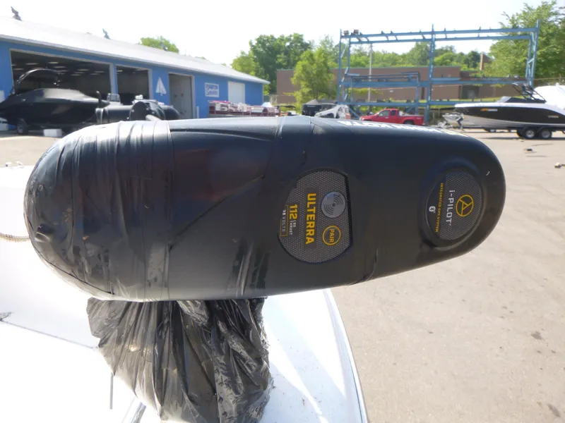 Slide: The Image of Minn Kota Ulterra motor on a 2003 Sea Pro 220 Center Console boat, outdoor setting. - 9