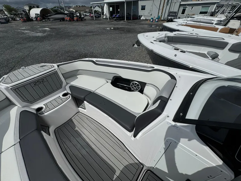 Slide: The Image of 2023 Yamaha Boats 252SD interior with sleek seating and modern design. - 15
