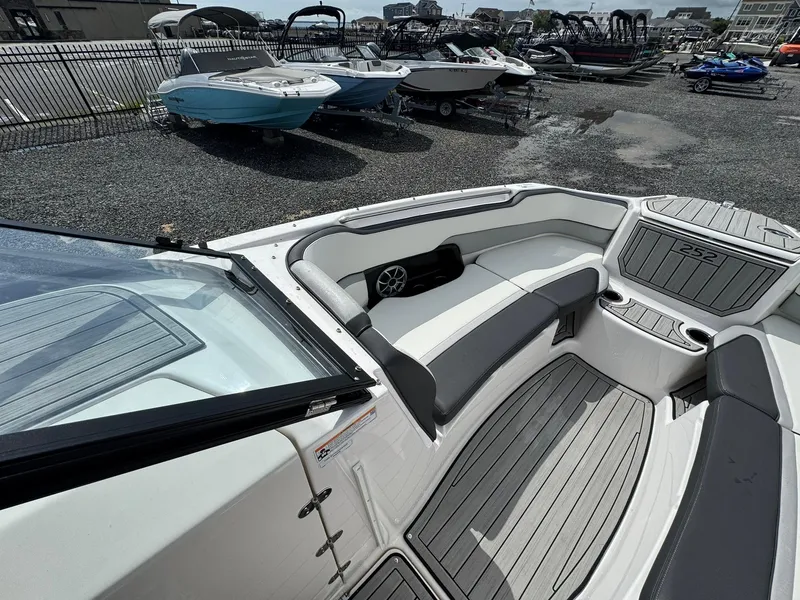 Slide: The Image of 2023 Yamaha Boats 252SD interior with sleek seating and modern design. - 16