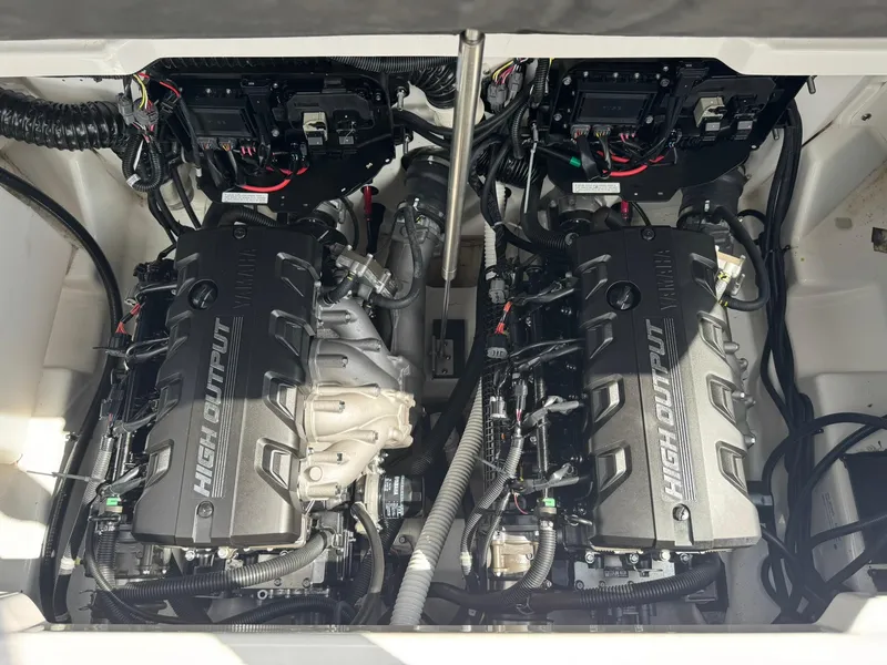 Slide: The Image of 2023 Yamaha Boats 252SD high output engines in engine compartment. - 19