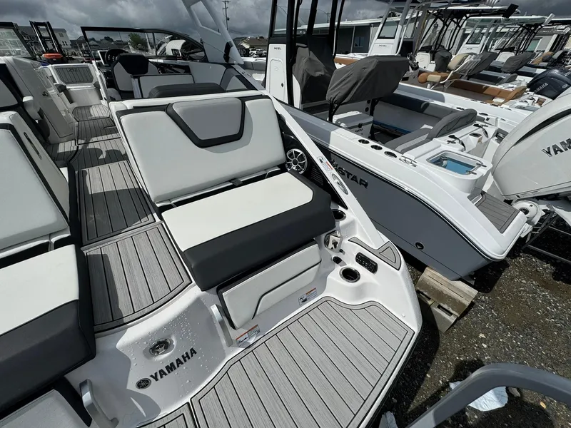 Slide: The Image of 2023 Yamaha Boats 252SD interior with sleek seating and modern design. - 9