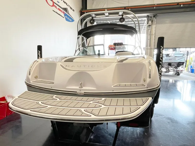 Slide: The Image of 2005 Nautique Air Nautique SV-211 boat in showroom, rear view with swim platform. - 5