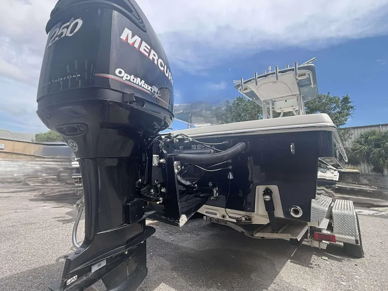Slide: The Image of 2015 Andros Tarpon 26 boat with Mercury OptiMax 250 engine on trailer. - 16