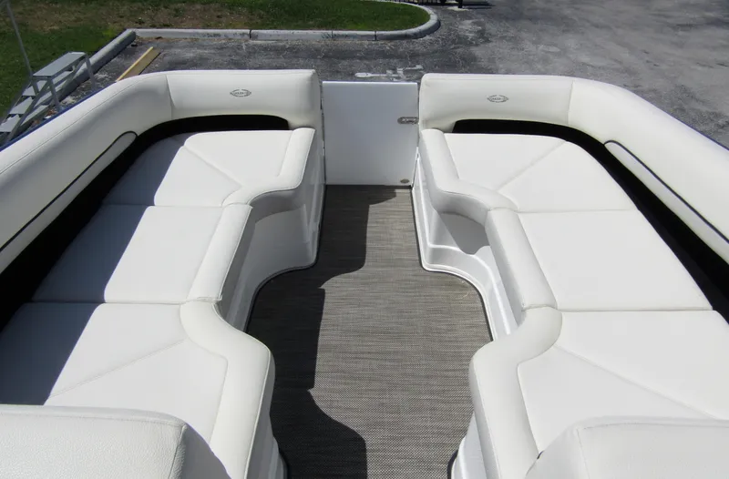 Slide: The Image of 2017 Cobalt Marker One Ml4 boat interior with white cushioned seating and carpeted floor. - 13