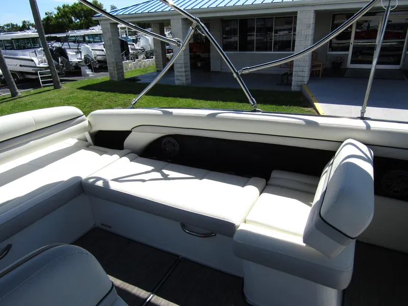 Slide: The Image of 2017 Cobalt Marker One Ml4 boat interior with white seating and outdoor view. - 15