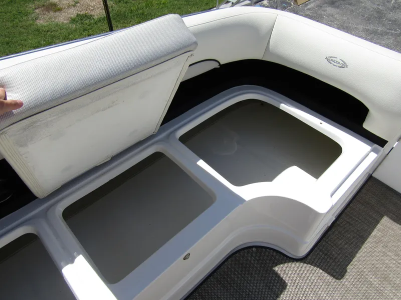 Slide: The Image of Open storage compartment in 2017 Cobalt Marker One Ml4 boat. - 16