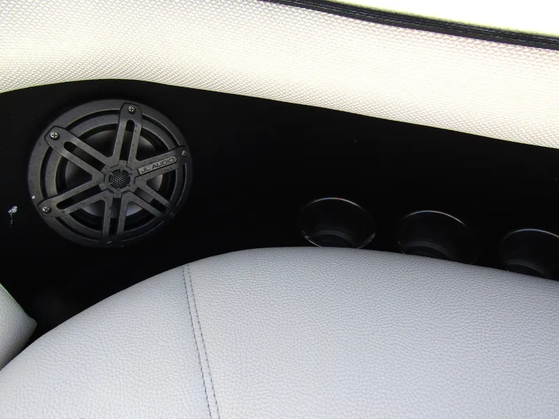 Slide: The Image of Interior of 2017 Cobalt Marker One Ml4 with JL Audio speaker and white upholstery. - 17