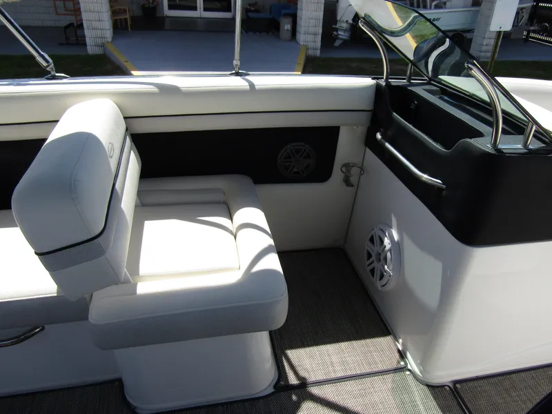 Slide: The Image of 2017 Cobalt Marker One Ml4 boat interior with white seating and modern dashboard design. - 25