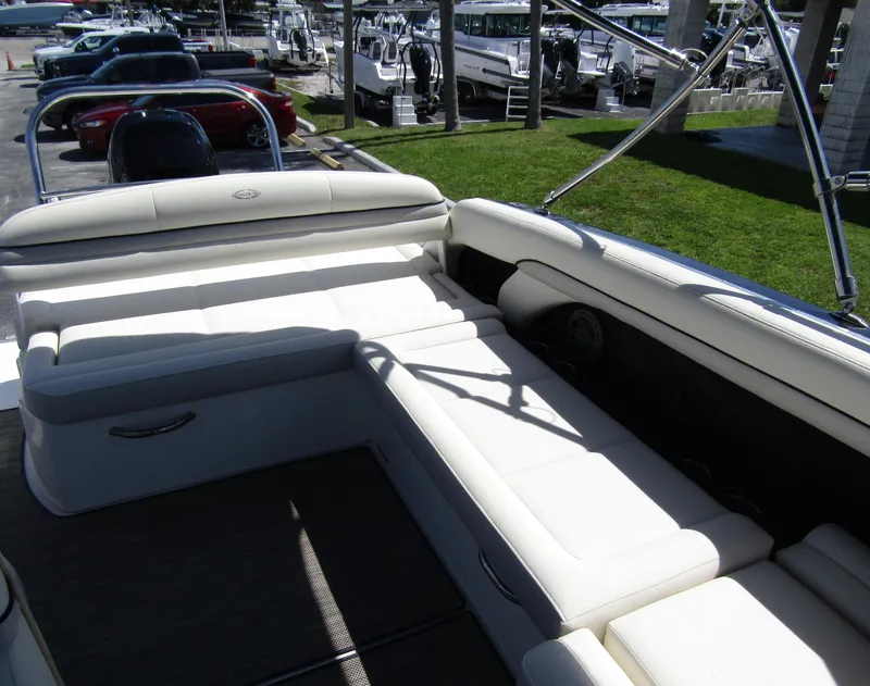 Slide: The Image of 2017 Cobalt Marker One Ml4 boat interior with white cushioned seating and sleek design. - 27