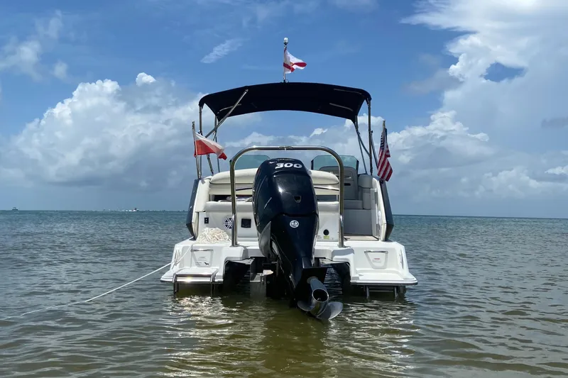 Slide: The Image of 2017 Cobalt Marker One Ml4 boat with outboard motor on calm water. - 3