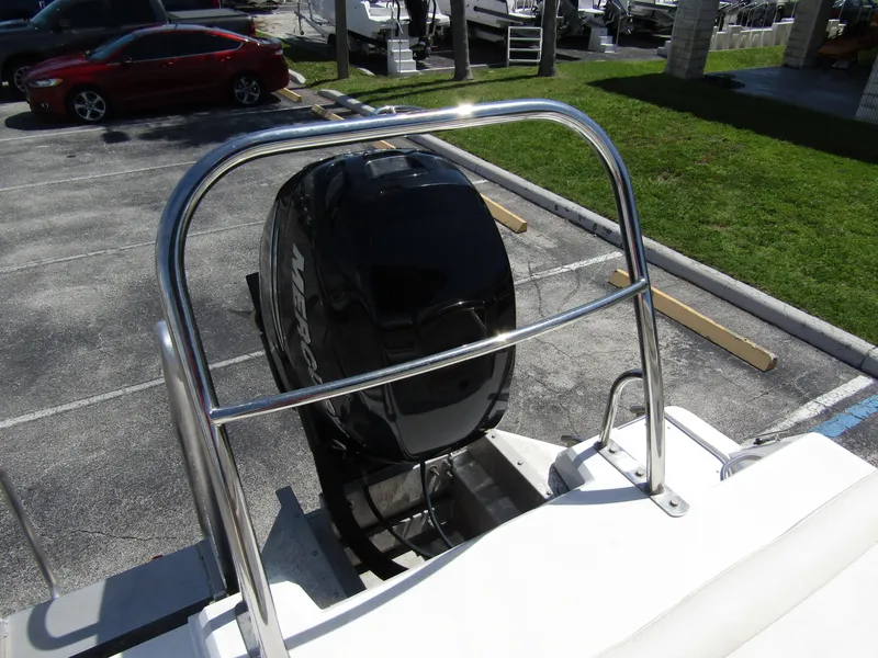 Slide: The Image of 2017 Cobalt Marker One Ml4 boat with Mercury outboard engine in a parking lot. - 32