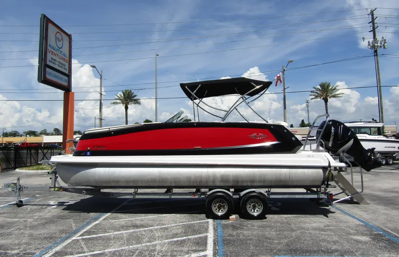 Slide: The Image of 2017 Cobalt Marker One Ml4 pontoon boat on trailer at dealership. - 5
