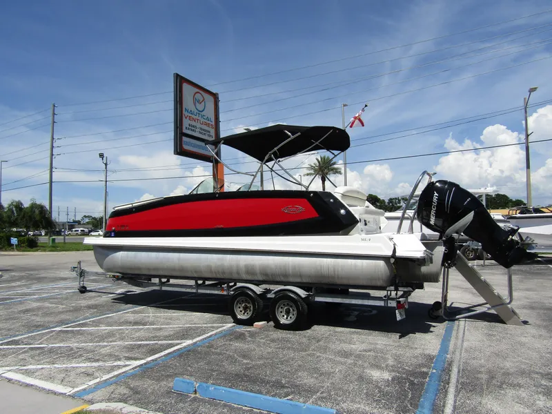 Slide: The Image of 2017 Cobalt Marker One ML4 pontoon boat on trailer at Nautical Ventures dealership. - 7