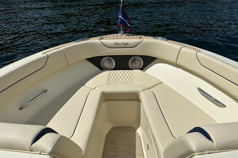 Slide: The Image of 2026 Chris-Craft Sportster 25 boat interior with luxurious seating and elegant design. - 13