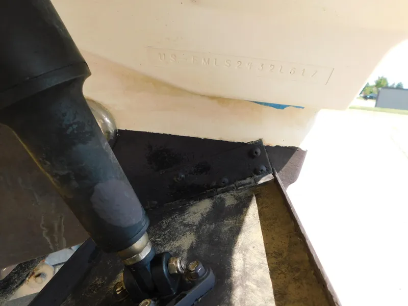 Slide: The Image of Close-up of a 2017 Cutwater C-24 boat hull with visible serial number. - 11