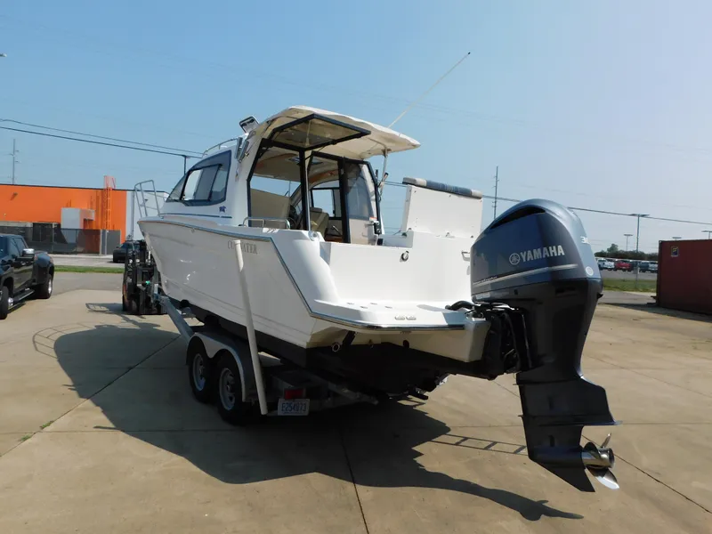 Slide: The Image of 2017 Cutwater C-24 boat with Yamaha outboard motor on a trailer. - 12