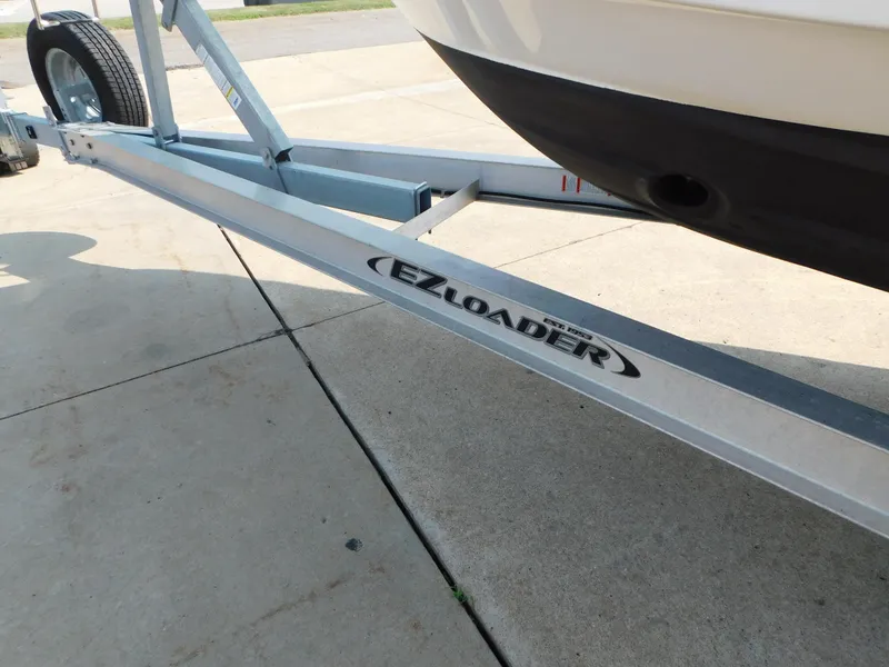 Slide: The Image of 2017 Cutwater C-24 on EZ Loader trailer, parked on concrete surface. - 14