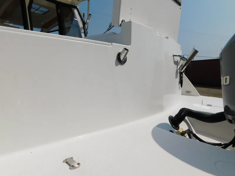 Slide: The Image of 2017 Cutwater C-24 boat deck with motor and fittings. - 17