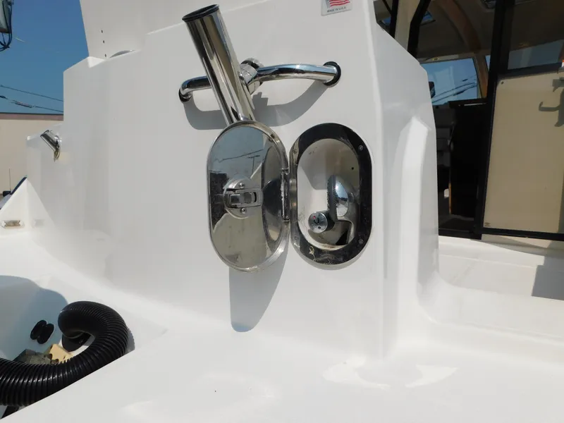 Slide: The Image of 2017 Cutwater C-24 boat detail showing deck fittings and chrome hardware. - 18