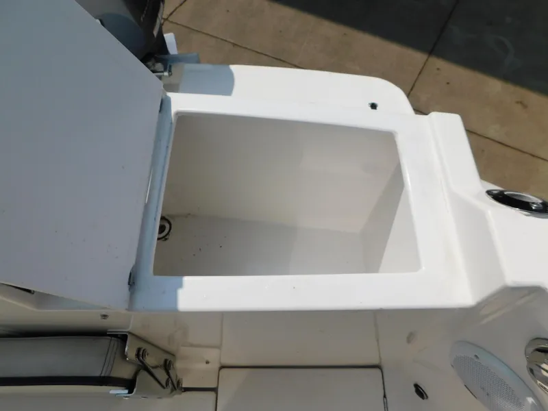 Slide: The Image of Open storage compartment on a 2017 Cutwater C-24 boat. - 27