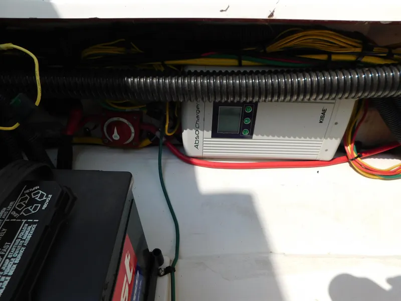 Slide: The Image of Electrical system of a 2017 Cutwater C-24 boat, featuring a KISAE charger and battery setup. - 35