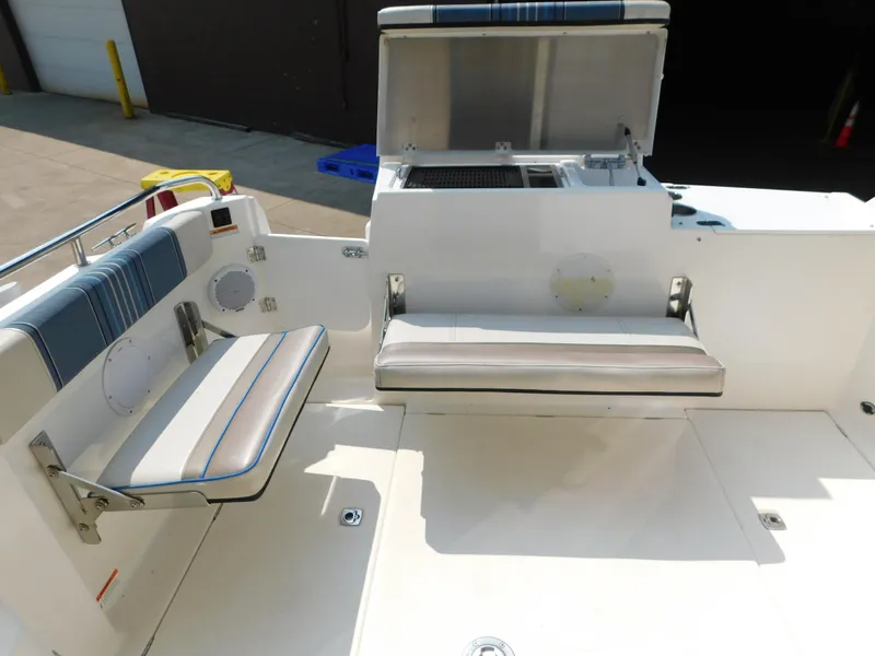 Slide: The Image of 2017 Cutwater C-24 boat interior with foldable seating and storage compartment. - 45